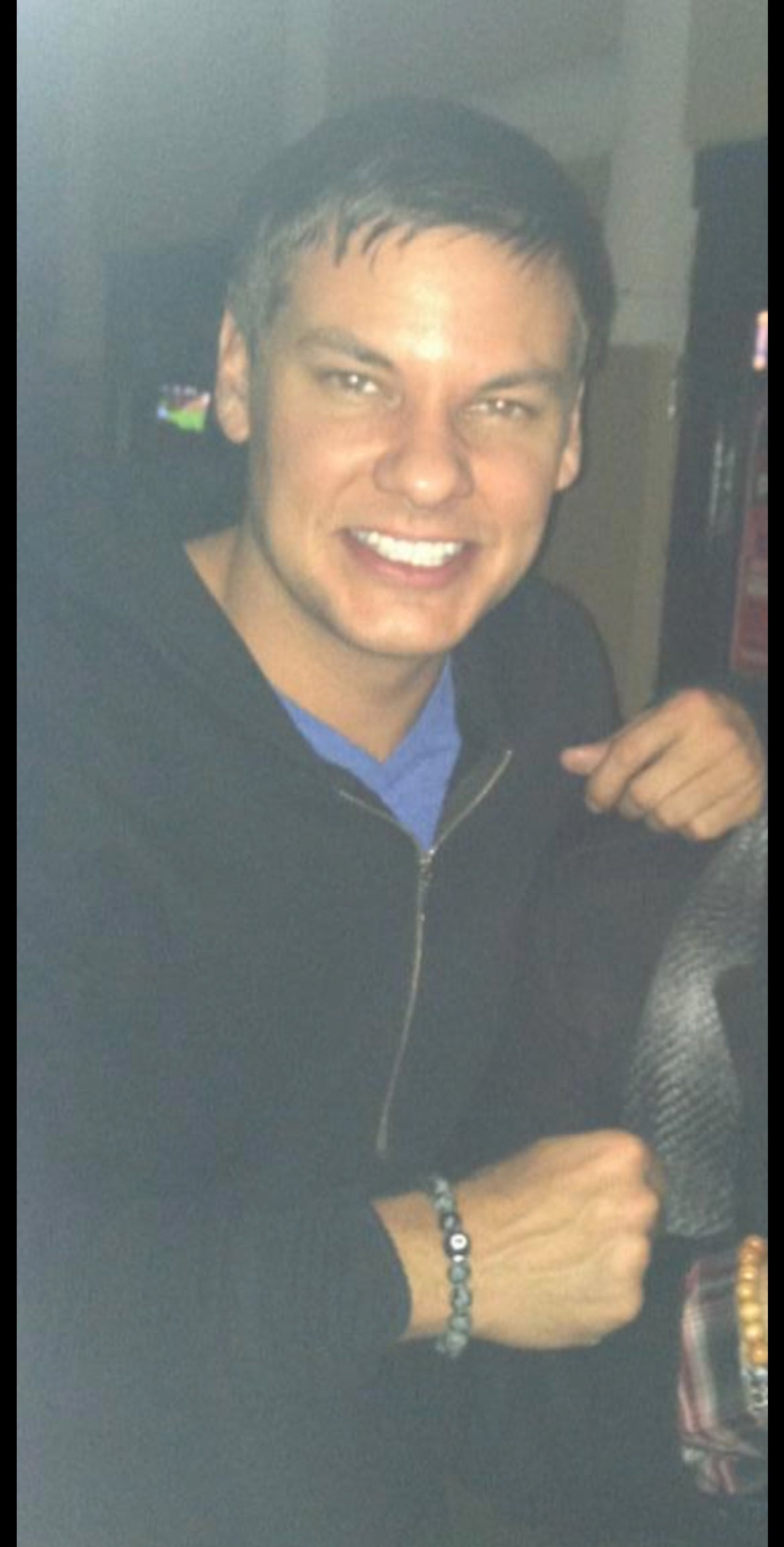 Comedian “Theo Von” wearing grey black speckled stones bracelet