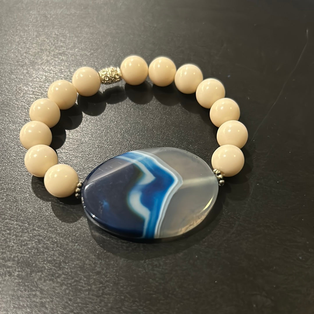 Ivory stones w/Large Blue Agate Gemstone