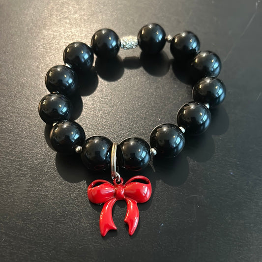 Black beads w/Cute Red Bow stretch bracelet