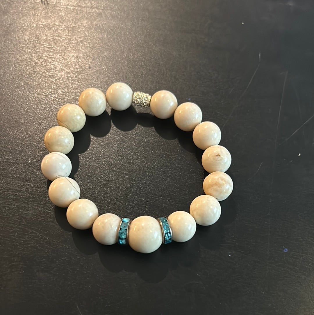 Ivory stones w/turquoise rhinestone accents