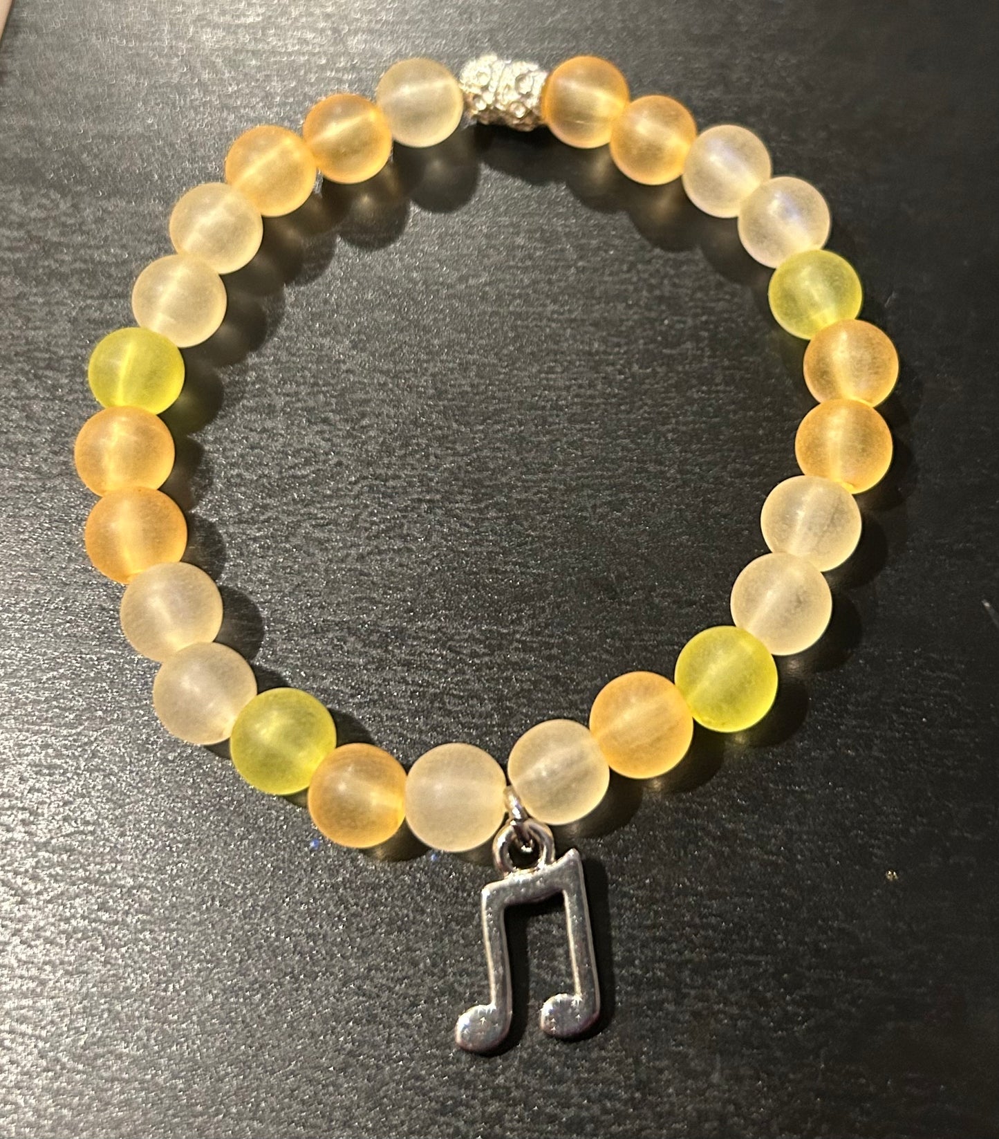 Lemon glass beach stones w/silver metal music notes charm