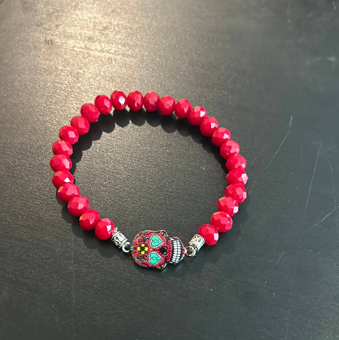 Red faceted beads w/Sugar Skull