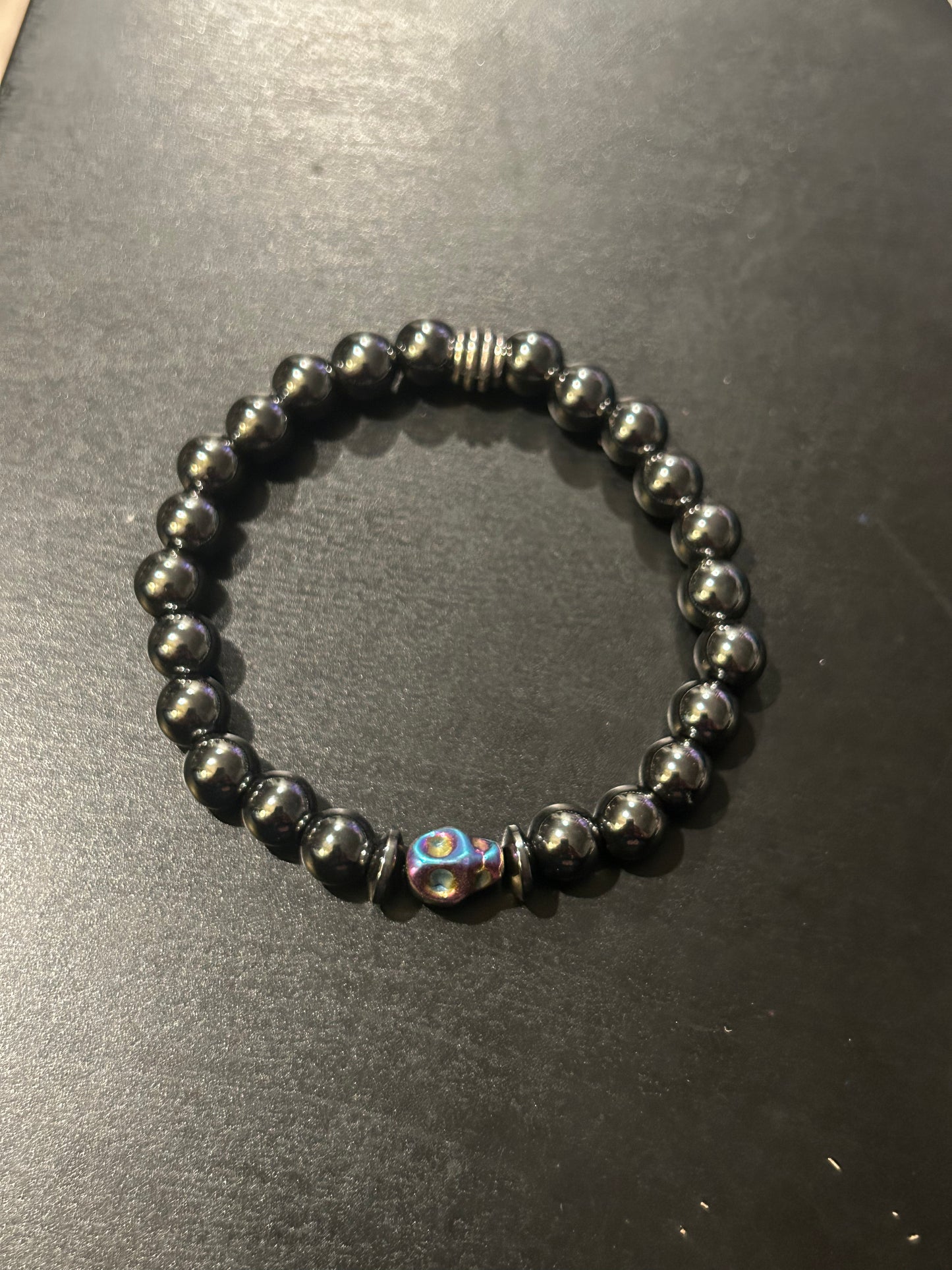 Hematite metal w/Iridescent 3D Skull