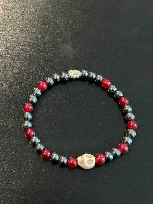 Mini hematite w/red Ivory 3D Skull