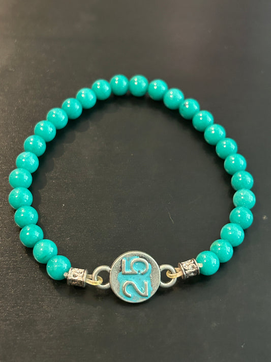 Turquoise 25 metal charm bracelet