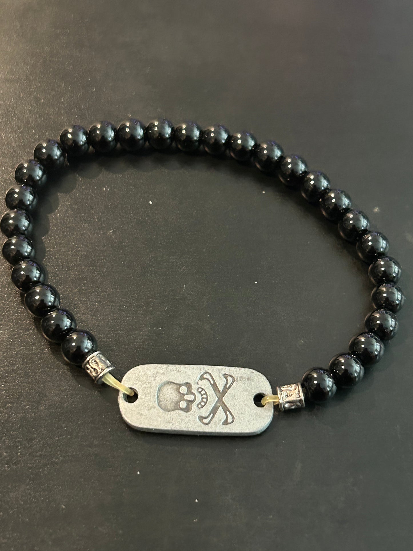 Black beads w/Metal skull & crossbones