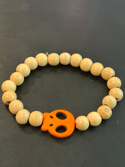 Light maple wood beads w/tangerine flat skull